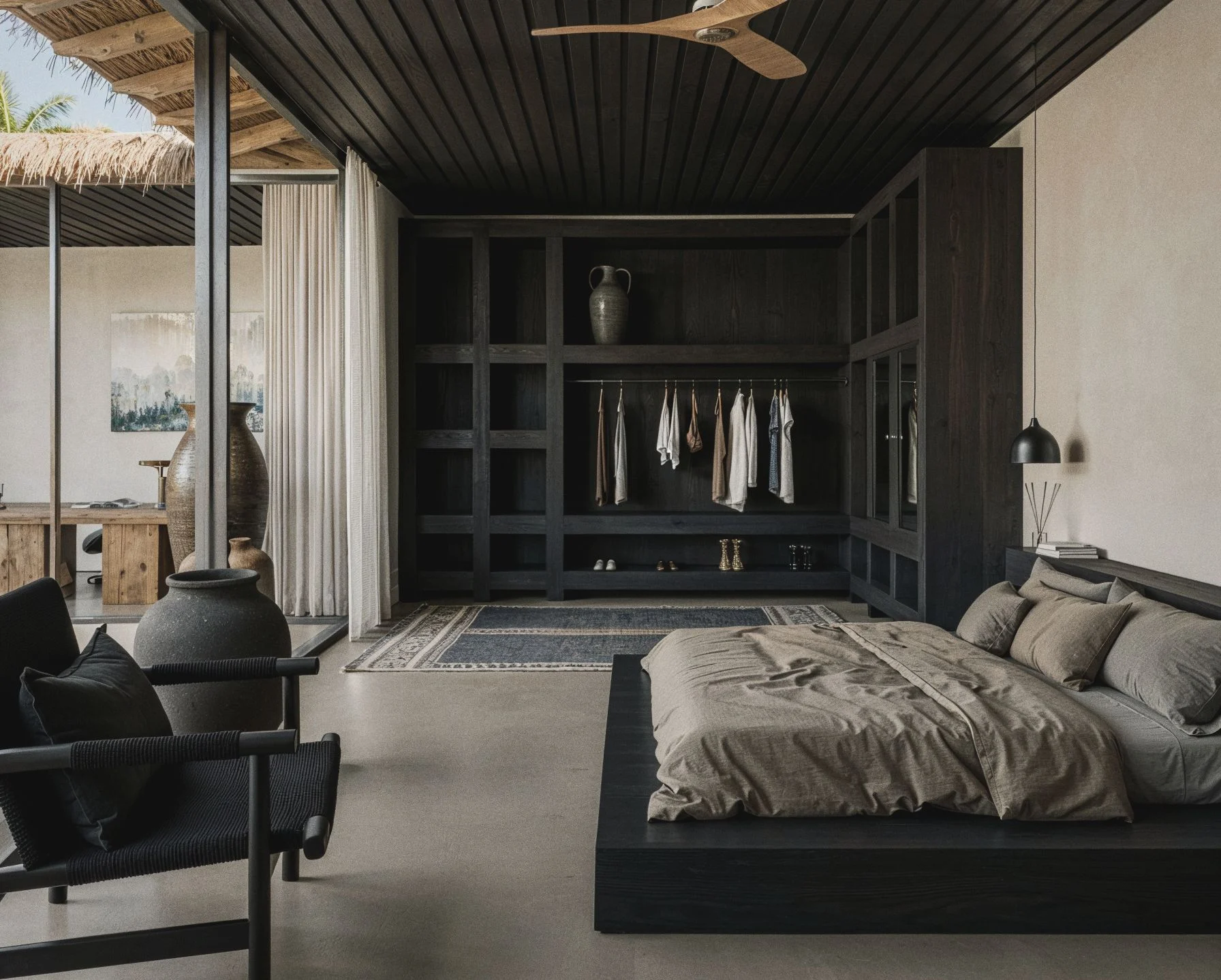 Malika Villa — main bedroom with dark timber joinery and open dressing room