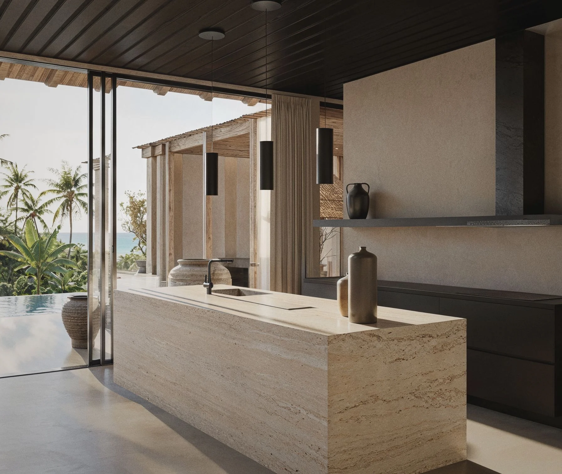Malika Villa — kitchen with travertine island opening onto the pool and palm trees
